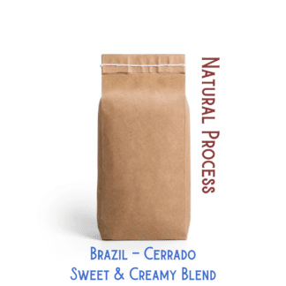 A coffee bag labeled, "Natural process sweet and creamy blend coffee from Cerrado, Brazil"